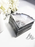 'SILVER BULLET' triangle coasters